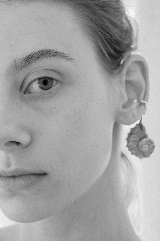 Mauve-hued Shell, Held in Sterling Silver